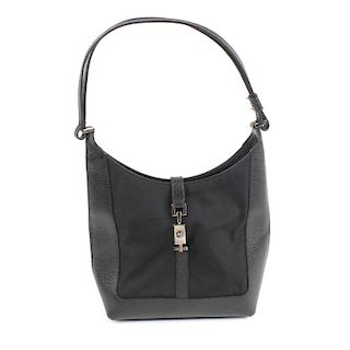 GUCCI - a black shoulder bag. Crafted from nylon and pebbled leather, featuring a single leather han