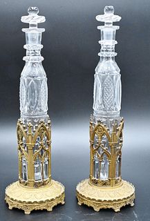 Pair of Crystal Bottles, having gilt bronze holders, height 12 1/2 inches.