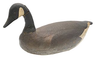 Goose Decoy, in old paint, height 11 inches, length 23 inches. Provenance: Estate of Florence Yannios, Cheshire, CT.