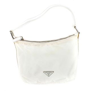 PRADA - a nylon white bag. The white nylon bag with white leather strap and triangular white enamel