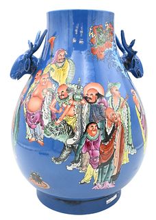 Large Chinese Porcelain Niutou Zun Vase, having blue ground with painted figures and molded deer handles, seal mark on bottom, height 18 inches.
