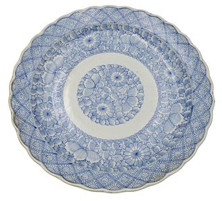 Large Blue and White Chinese Charger, painted with flower and leaf design, diameter 18 1/2 inches.