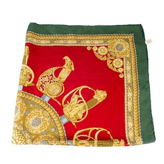 GUCCI - a silk scarf. The gold coloured patterned shield to the centre surrounded by decorative swor