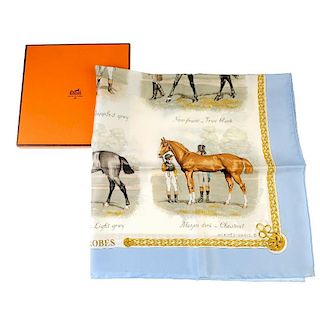 HERMES - a 'Les Robes' scarf. Depicting nine horses with their respective riders, written below each