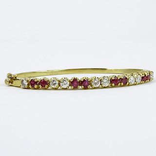 Lady's Vintage Approx. 1.70 Carat Diamond, 1.85 Carat Ruby and 14 Karat Yellow Gold Bangle Bracelet.