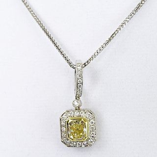 Approx. 1.25 Carat Radiant Cut Fancy Light Yellow Diamond and 18 Karat White Gold Pendant.
