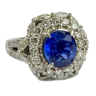 GIA Certified 5.93 Carat Ceylon Sapphire and Round Brilliant Cut and Marquise Cut Diamonds Weighing approximately 3.00 Carats Mounted in an Italian Pl