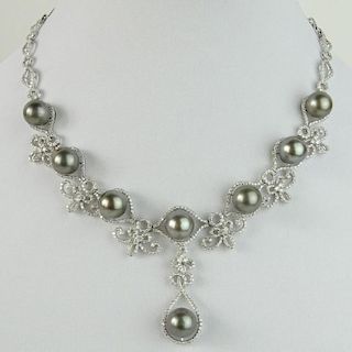Tahitian Black Pearl, 9.48 Carat Round Cut Diamond and 14 Karat White Gold Necklace.
