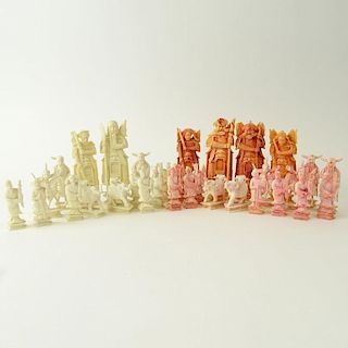 Lot of 32 Carved Ivory Chess Pieces (16 white, 16 colored).
