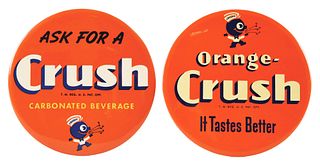 LOT OF 2: ORANGE CRUSH CELLULOID OVER CARDBOARD SIGNS.