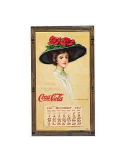 1911 FRAMED AND MATTED COCA-COLA CALENDAR. 
