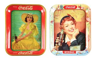 A PAIR OF COCA-COLA BOTTLE TRAYS.