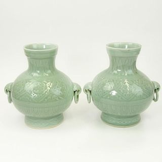 Pair of 2 Contemporary Korean Style Porcelain Figural Ring Handled Vases.