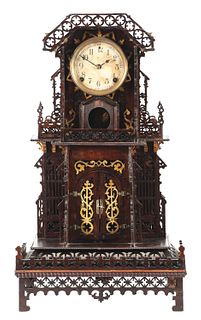EARLY FORESTVILLE CARVED MUSICAL CLOCK.