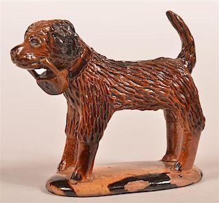 Glazed Redware Pottery Figure of a Dog.