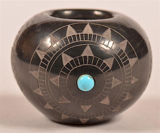 Pueblo Indian Carved Blackware Miniature Jar.