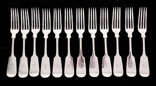 A Set of 12 Sterling Forks by Wood and Hughes