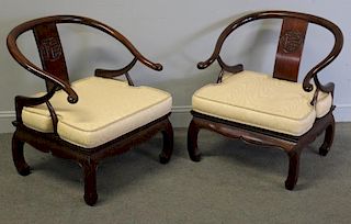 Pair of Asian Horseshoe Back Rosewood Arm Chairs.