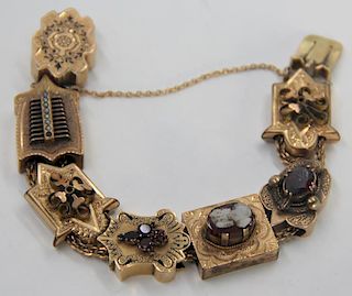 JEWELRY. Victorian 10kt Gold Slide Charm Bracelet.