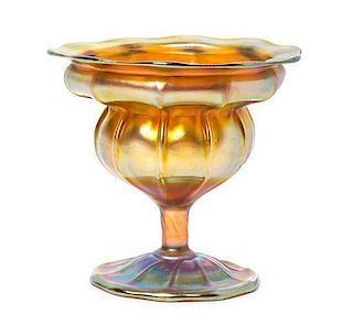 A Tiffany Studios Gold Favrile Glass Compote, Height 6 inches.