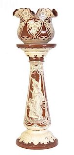 An Art Nouveau Pottery Jardiniere and Pedestal, Watcombe, Height overall 38 3/4 inches.