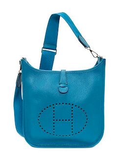 An Hermes Bleu Izmir Taurillon Clemence Evelyne III PM Handbag, 11.25" x 12" x 2.5".