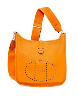 An Hermes Orange Evelyne III PM Handbag, 11.25" x 12" x 2.5".
