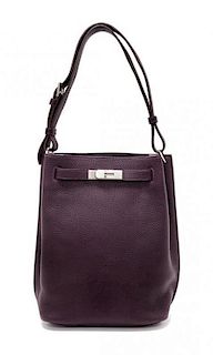 An Hermes Raisin Togo 22cm So-Kelly Handbag, 9" x 11" x 4.5".