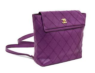 A Chanel Purple Quilted Caviar Leather Backpack, 12" x 10" x 3".