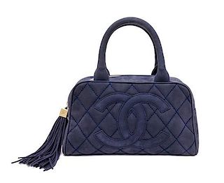 A Chanel Blue Suede Quilted Bowling Bag, 11" x 6.5" x 4.5".
