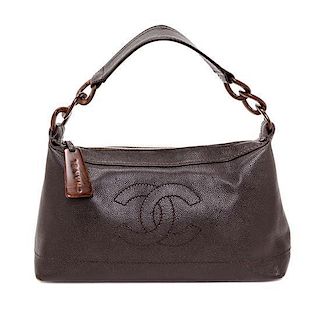 A Chanel Brown Caviar Leather Handbag, 14" x 8" x 5".