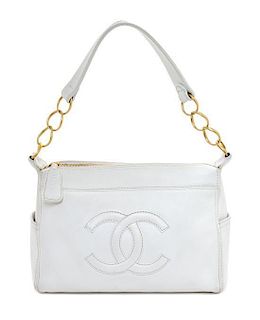 A Chanel White Caviar Leather Handbag, 14" x 8" x 5".