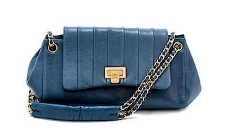 A Chanel Blue Calfskin Leather Accordian Flap Handbag, 9" x 5" x 4".