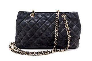 A Chanel Black Distressed Leather Quilted Handbag, 12" x 8" x 4".
