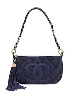 A Chanel Blue Suede Quilted Shoulder Bag, 10" x 6" x 1.5".