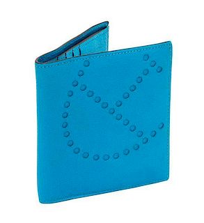 An Hermes Saint Cyr Blue Leather Evelyne Wallet, 4" x 4" x .25".