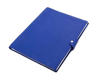 An Hermes Bleu Electrique Togo Ulysse MM Notebook Cover, 9" x 7.5".