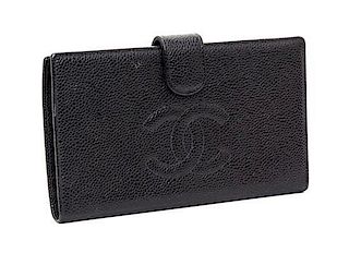 A Chanel Black Caviar Leather Wallet, 7" x 4" x .5".