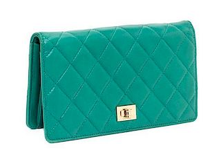 A Chanel Emerald Quilted Calfskin Leather Wallet, 7.25" x 4" x 1".
