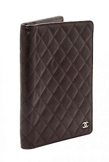 A Chanel Brown Caviar Quilted Leather Portfolio, 6.5" x 8.75" x .75".