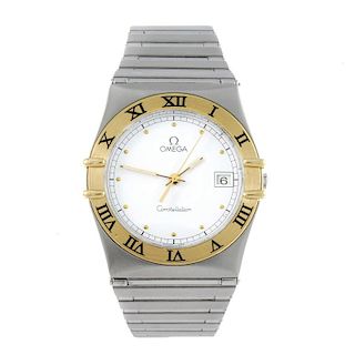 OMEGA - a gentleman's Constellation bracelet watch. Stainless steel case with yellow metal chapter r