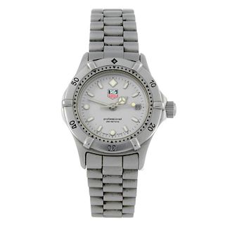 TAG HEUER - a lady's 2000 Series bracelet watch. Stainless steel case with calibrated bezel. Referen