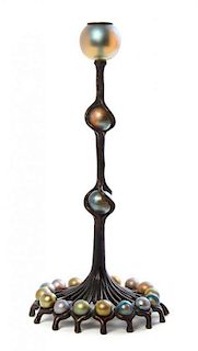 A Tiffany Studios Favrile Glass and Bronze Ball Candlestick, Height 14 1/2 inches.