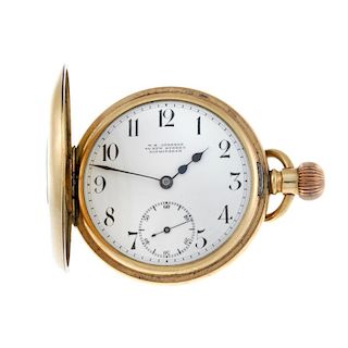 A half hunter pocket watch by W.E Johnson. Gold plated case. Unsigned keyless wind movement with clu