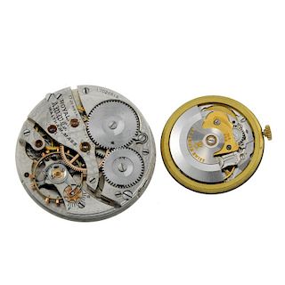 A pair of watch movements, consisting of a Garrard automatic watch movement and a Waltham pocket wat