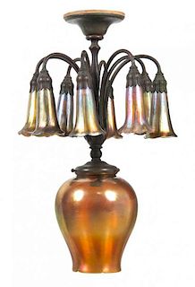 A Tiffany Studios Gold Favrile and Bronze Chandelier, Height overall 21 1/4 inches, height of central shade 8 1/2 inches.