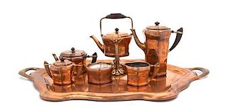 A Tiffany Studios Copper Tea and Coffee Set, Width of tray over handles 32 1/8 inches.