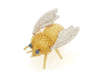 A diamond and sapphire bee brooch