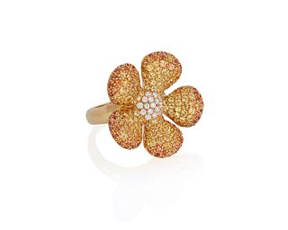 A diamond and colored sapphire flower ring