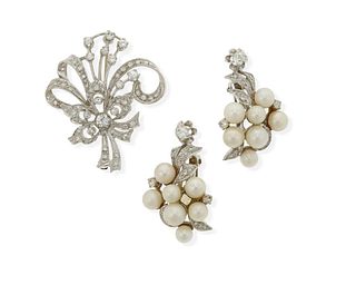 An assembled set of diamond and pearl jewelry